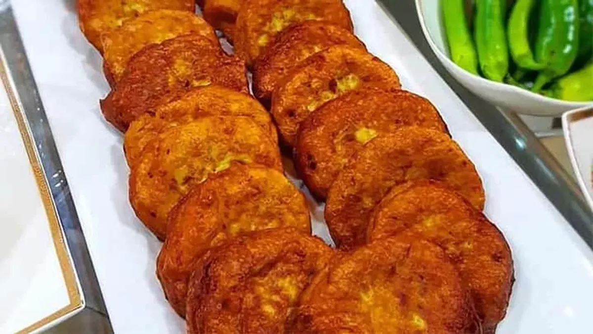 طرز تهیه کوکوی جنوبی بدون سیب زمینی؛ یک کوکوی خیابانی تند و خوشمزه| روش درست کردن ساندویچ کوکو پکورای
